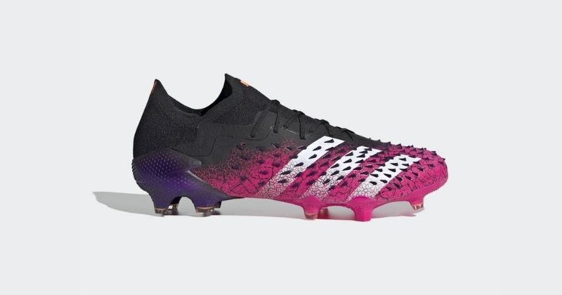 black and pink adidas predator freak football boot