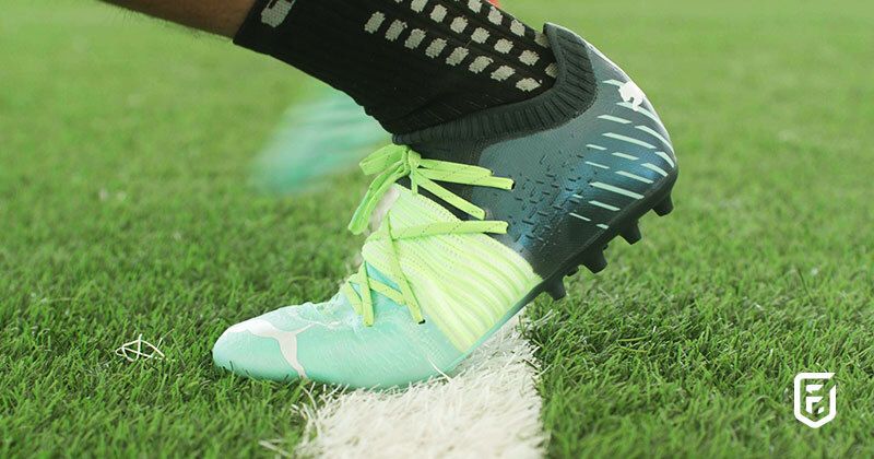 moulded stud football boot on 4g artificial turf