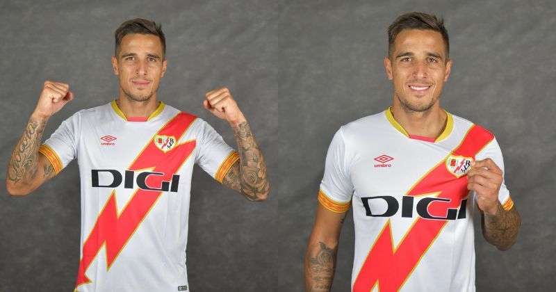 player wearing rayo vallecano 2023-24 home shirt in white with red bolt