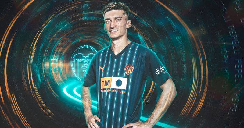 valencia 2023-24 away shirt in dark blue with white stripes and orange