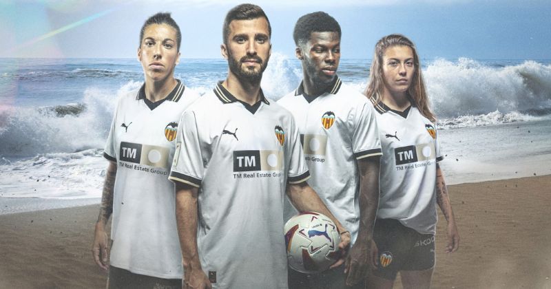 male and female players wearing valencia 2023-24 home shirt in white