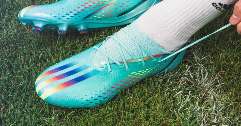 football boot being laced up on feet