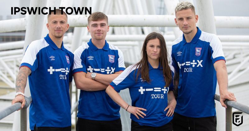 male and female players wearing ipswich town 2023-24 home shirts in blue and white