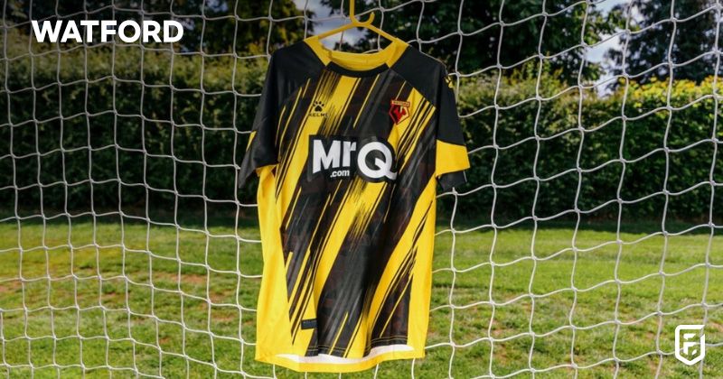 yellow and black watford home shirt 2023-24 hanging in goalposts